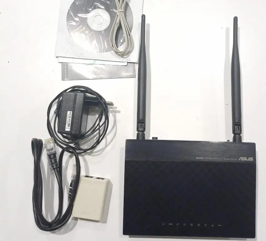 Asus Dsl-N12E 300Mbps Kablosuz-N ADSL2+ 4 Port Modem Kullanılmış Asus Dsl-N12E 300Mbps Kablosuz-N ADSL2+ 4 Port Modem Kullanılmış
